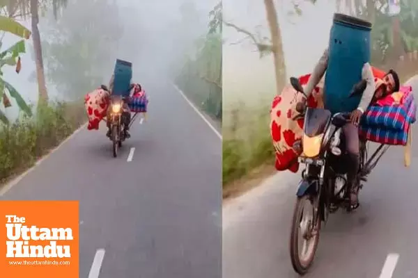 Desi Hack to Beat the Cold: Man Rides Bike Wearing a Plastic Drum, Friend Sleeps on Cot Behind; Video Goes Viral