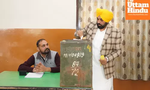 BHAGWANT MANN CASTS VOTE IN HIS NATIVE VILLAGE