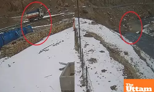 Speeding truck plopes into river: Drivers narrow escape caught on camera, watch video Speeding truck plopes into river: Drivers narrow escape caught on camera, watch video