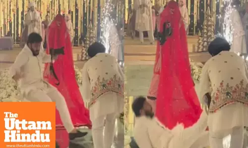 Photographer falls hard while chasing the perfect shot then surprises everyone leaving the Groom stunned video goes viral