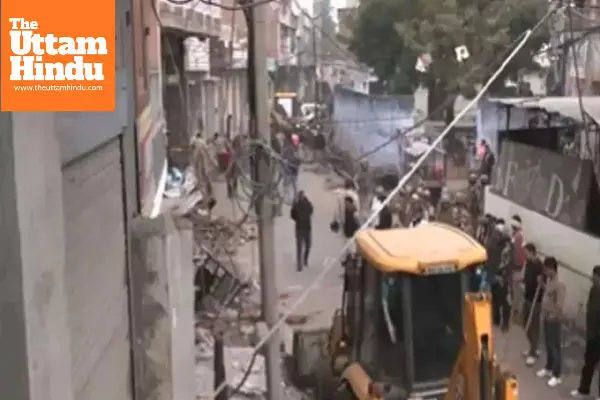 Bulldozer action after Chomu violence, illegal constructions of stone pelters demolished; action also taken against 20 illegal slaughterhouses Bulldozer action after Chomu violence, illegal constructions of stone pelters demolished; action also taken against 20 illegal slaughterhouses