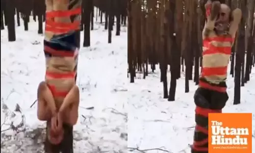 Horrifying punishment video shows man stripped, tied to tree in freezing cold