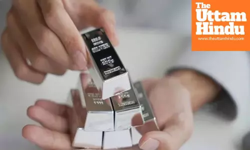 Silver loses its shine as global turmoil deepens, down 40% from highs; gold also slips