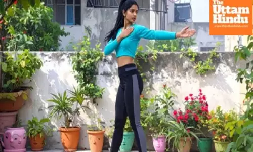 Practice Katichakrasana every day to trim stubborn belly fat