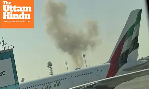 Suspected iranian drone strike near dubai airport sparks fire, flights temporarily suspended