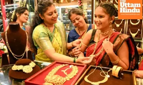 Gold dips after US Fed decision, silver slips below Rs 2.45 lakh
